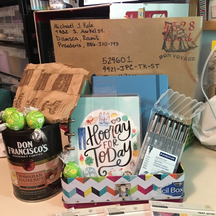 Notebook, coffee and package top